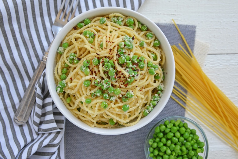 overhead of pasta and peas recipe in a bowl