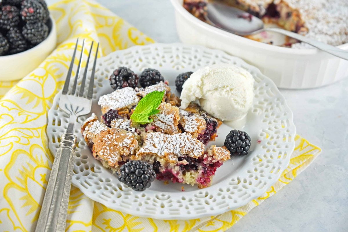 A Blackberry Buckle is the perfect way to kick off spring with your favorite berries. Perfect for breakfast, brunch and dessert! #blackberrybuckle #recipesthatuseblackberries www.savoryexperiments.com