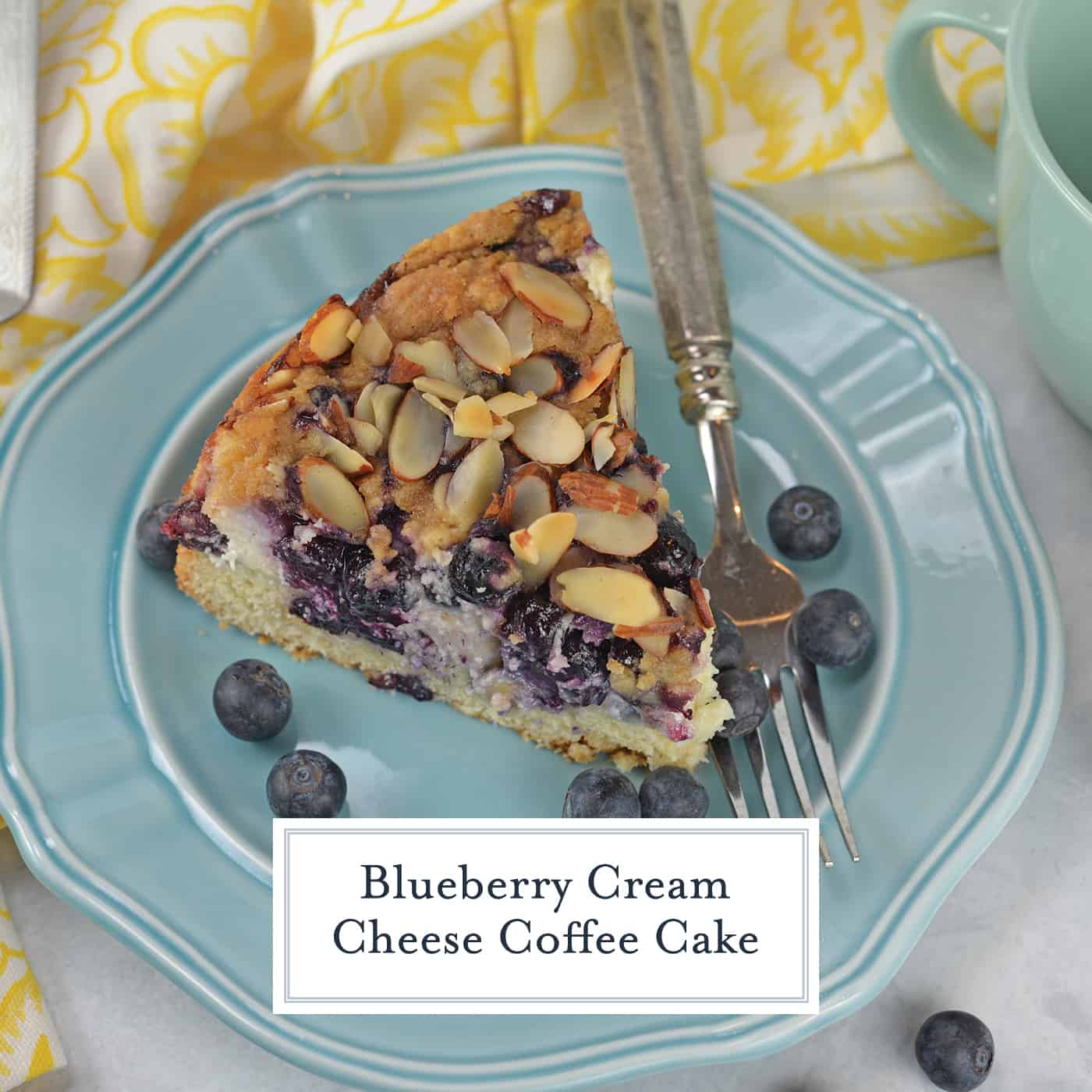 Blueberry Cream Cheese Coffee Cake is an easy coffee cake recipe with three layers of tender cake, silky cream cheese and almond streusel topping. #creamcheesecoffeecake #coffeecakerecipe #creamcheesecoffeecake www.savoryexperiments.com 