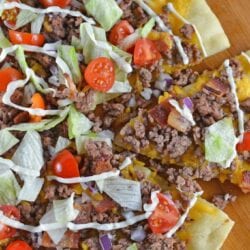 What happens when you take two favorites and mash them together? The best pizza ever! Cheeseburger Pizza! #homemadepizza #cheeseburgerpizza www.savoryexperiments.com