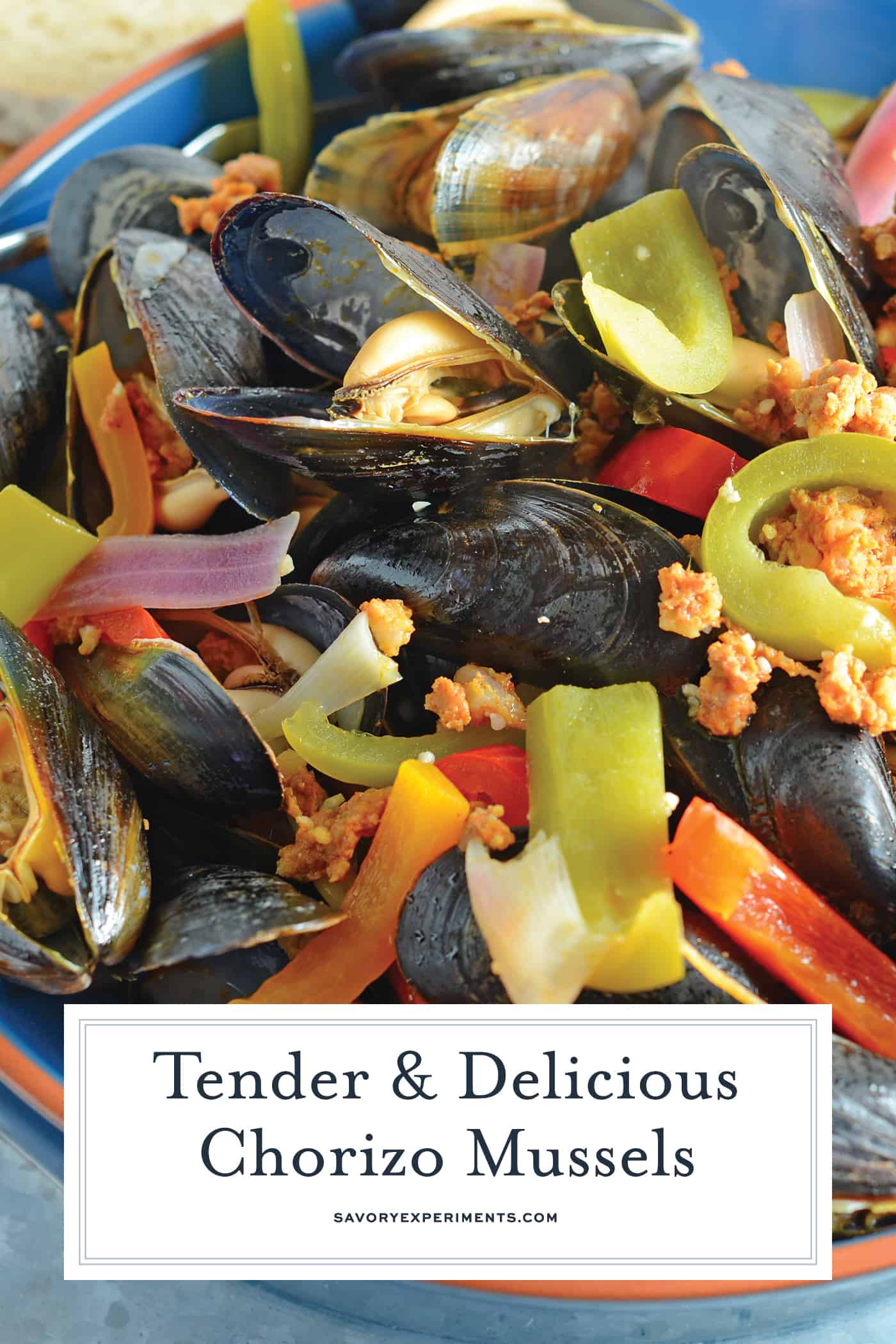 Chorizo Mussels are succulent, luscious tender mussels in a savory butter, chorizo wine sauce. Crusty bread is a must! #steamedmussels #easymusselrecipes #steampot www.savoryexperiments.com