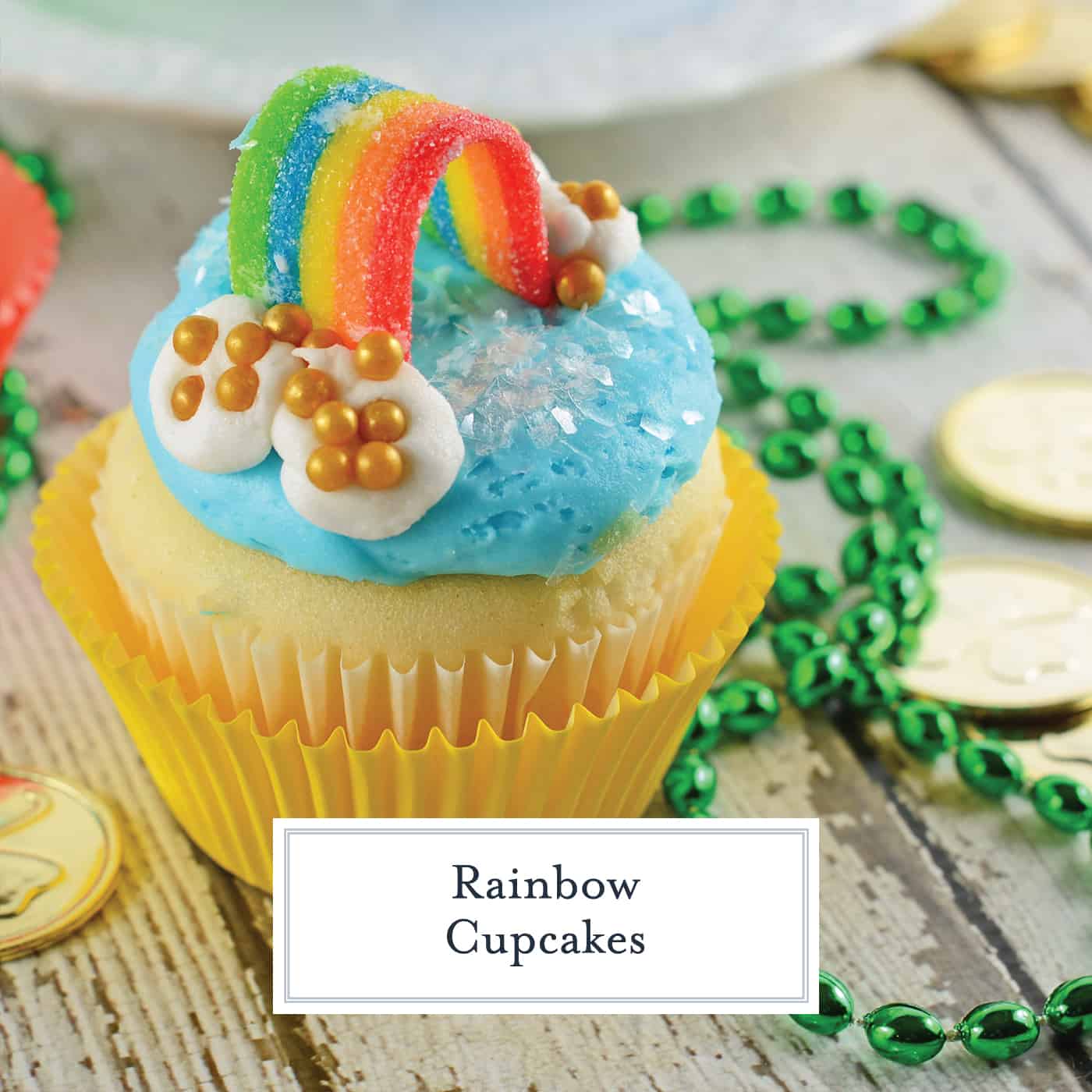 Rainbow Cupcakes are super easy and cute. The perfect cupcake for St. Patrick's Day, children's birthday parties or any random day of the week! #rainbowcupcakes #stapatricksdaydesserts www.savoryexperiments.com 