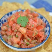 Pico de Gallo, also known as salsa fresca, is made from fresh tomato, onion, cilantro, hot pepper and lime juice. Perfect with tortilla chips! #picodegallo #homemadesalsa www.savoryexperiments.com