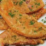 Chicken Fried Bacon is thick cut bacon dredged in seasoned flour, like chicken fried steak, and then fried to a golden brown and served with Cream Gravy.
