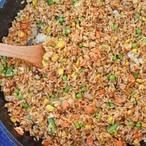 Easy Fried Rice is the best restaurant style fried rice you'll ever make! Just 15 minutes and a great way to clean out the vegetable drawer.