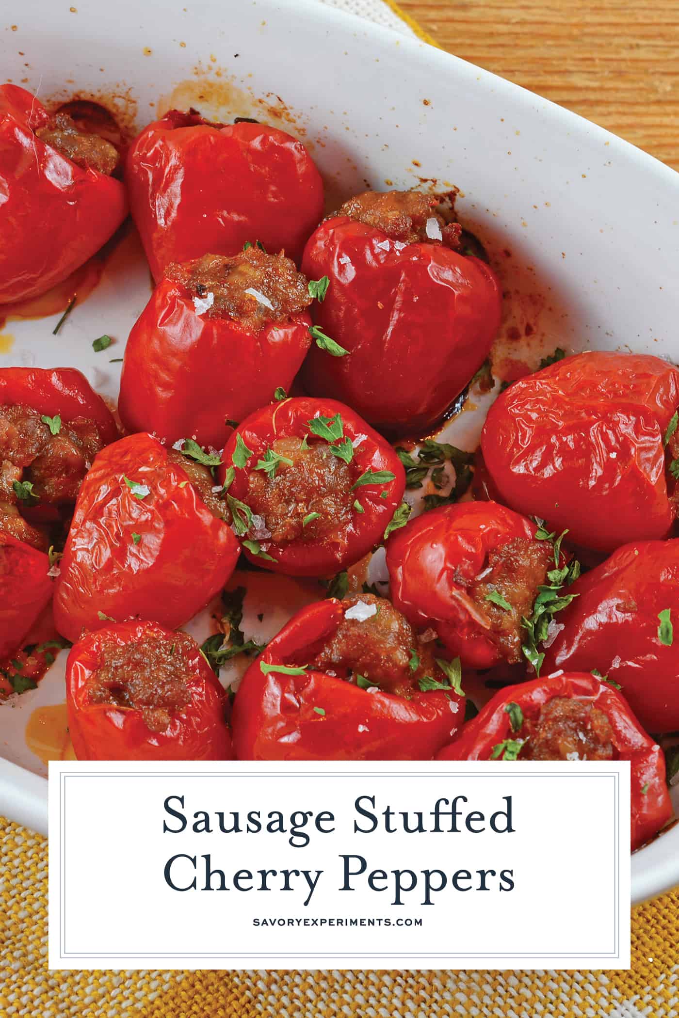 Sausage Stuffed Cherry Peppers are a tasty and easy appetizer recipe using only 5 ingredients. The perfect party food for any occasion! #stuffedpeppers #easyappetizers www.savoryexperiments.com