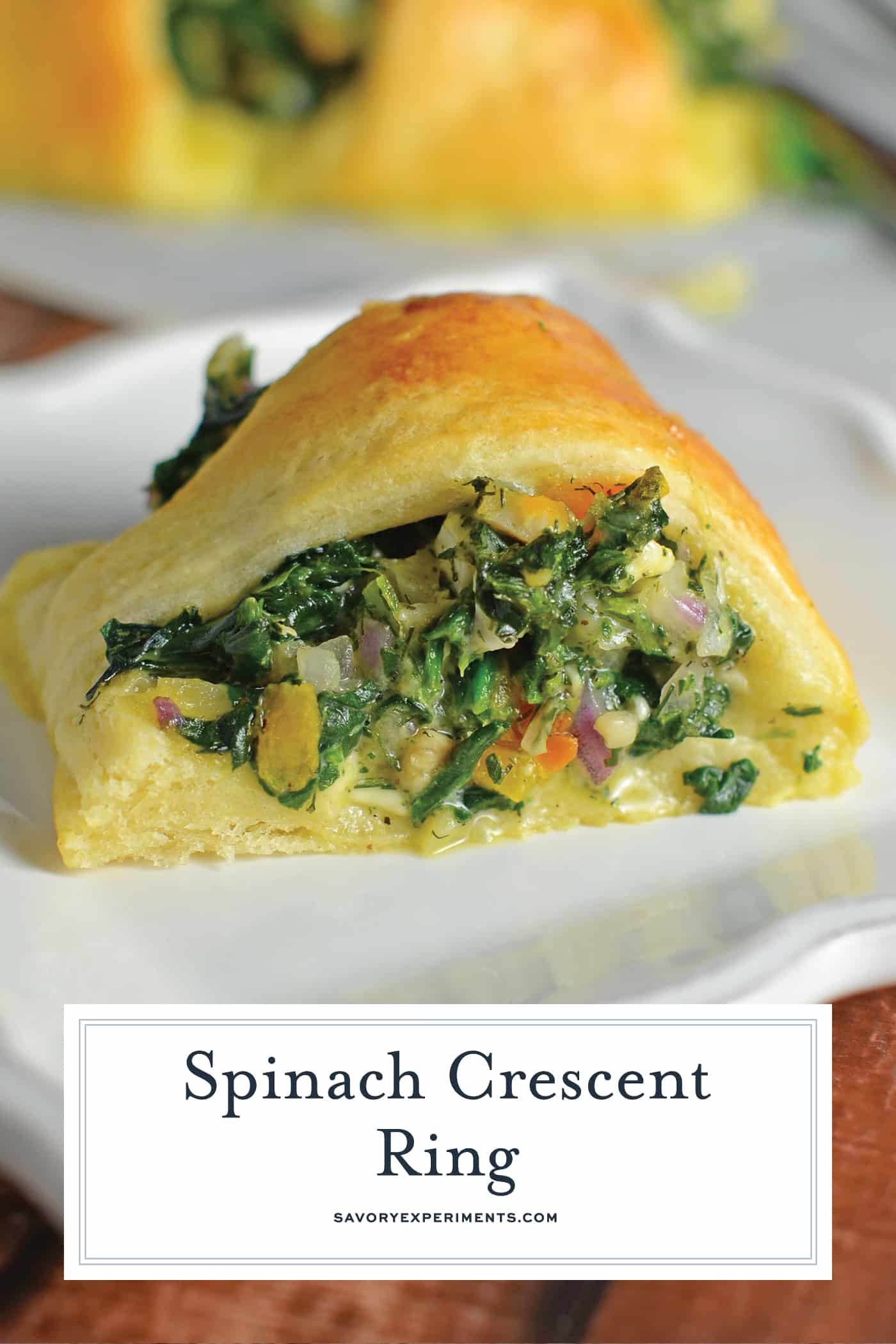 Spinach Crescent Ring is an easy brunch idea or appetizer recipe using spinach, bell pepper, onion, herbs and cheese. It is a hit at all of my parties! #crescentrollrecipes #appetizerideas #brunchrecipes www.savoryexperiments.com