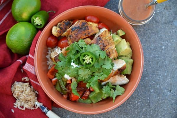 Chipotle Chicken Bowl 4 Chipotle Chicken Rice Bowls are a zesty chipotle chicken with fresh produce and sweet dressing. Ready in just 30 minutes and perfect as a meal prep recipe!