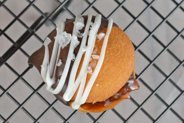 Chocolate Bacon Jam Cookies Chocolate Bacon Jam Cookies are an unexpected cookie sandwich filled with a sweet bacon jam and then dipped in dark chocolate and sprinkled with sea salt.