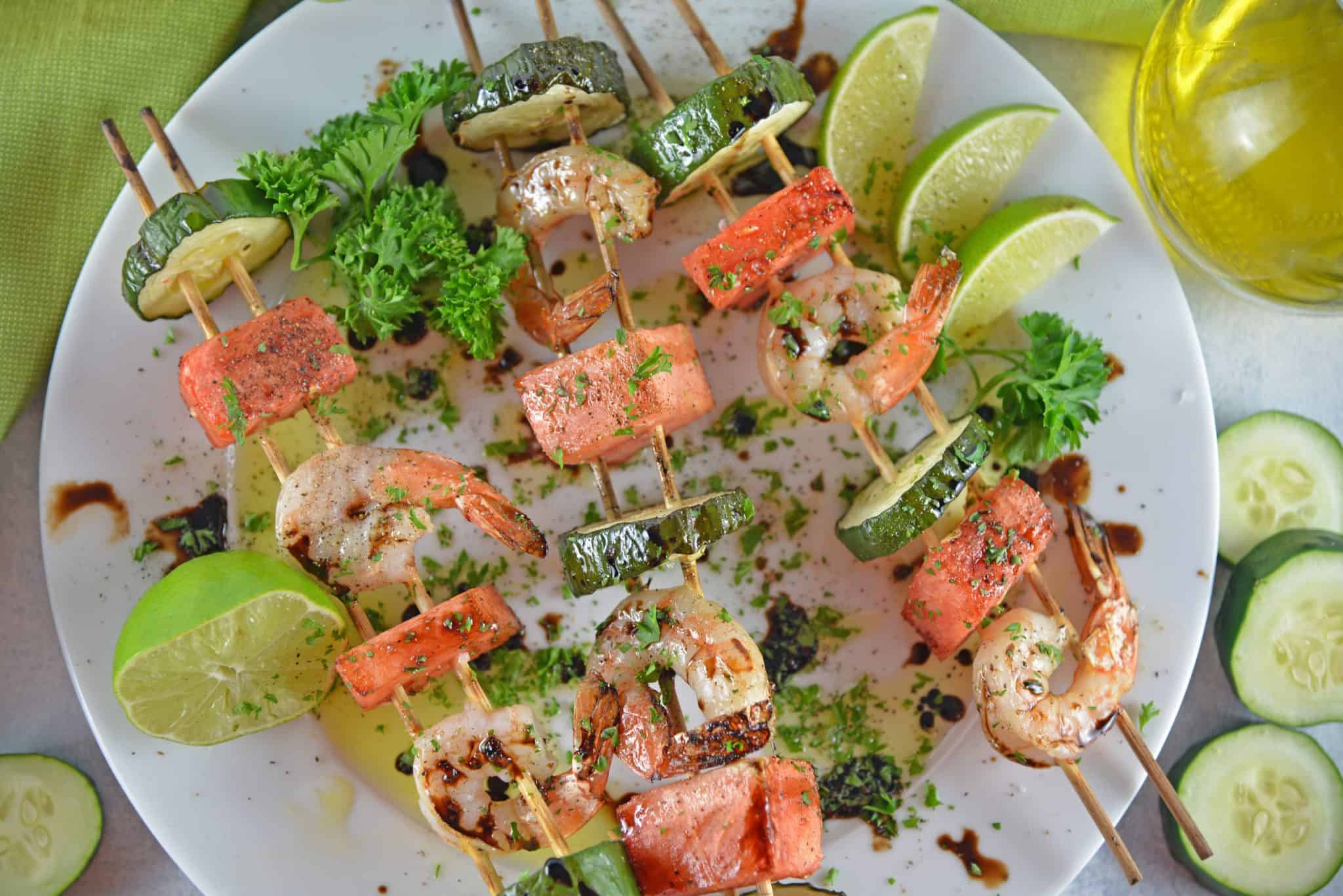 Watermelon Shrimp Kabobs combine grilled shrimp with grilled watermelon with a sweet balsamic reduction and zesty lime. A healthy kabob recipe on the grill.