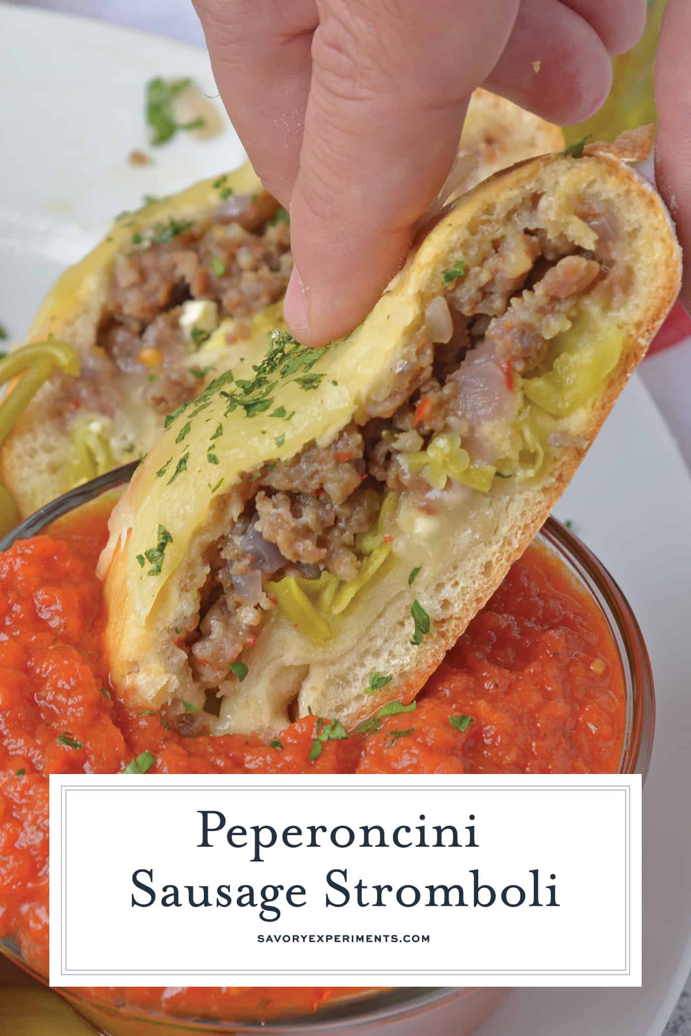 Peperoncini Sausage Stromboli is a crave-worthy, easy dinner recipe that your whole family will enjoy. Check out all the ways to make this dish your new family favorite. #strombolirecipes www.savoryexperiments.com