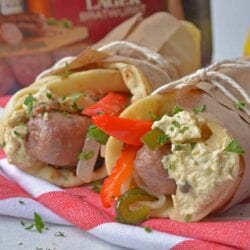 Mediterranean Yuengling Bratwurst use bratwurst injected with Yuengling, bell peppers and onion, garlic hummus and wrap them in naan. www.savoryexperiments.com