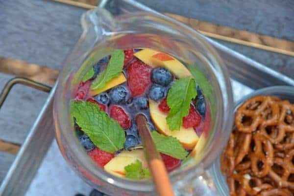Sparkling Peach Sangria 1 Sparkling Peach Sangria is the perfect summer cocktail recipe for your next party! Make a non-alcoholic and alcoholic version with fresh summer fruits.