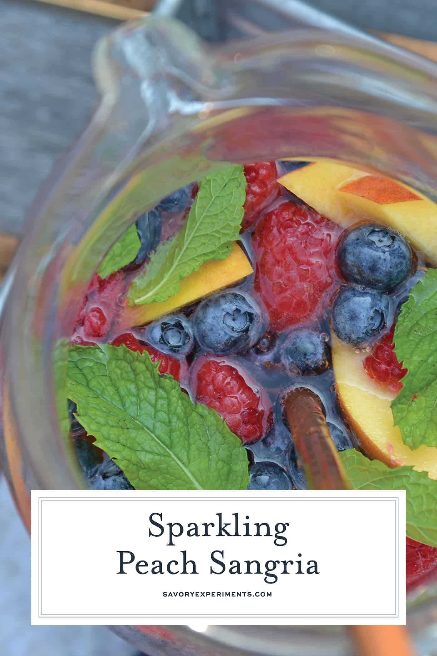 Sparkling white wine sangria in a glass pitcher