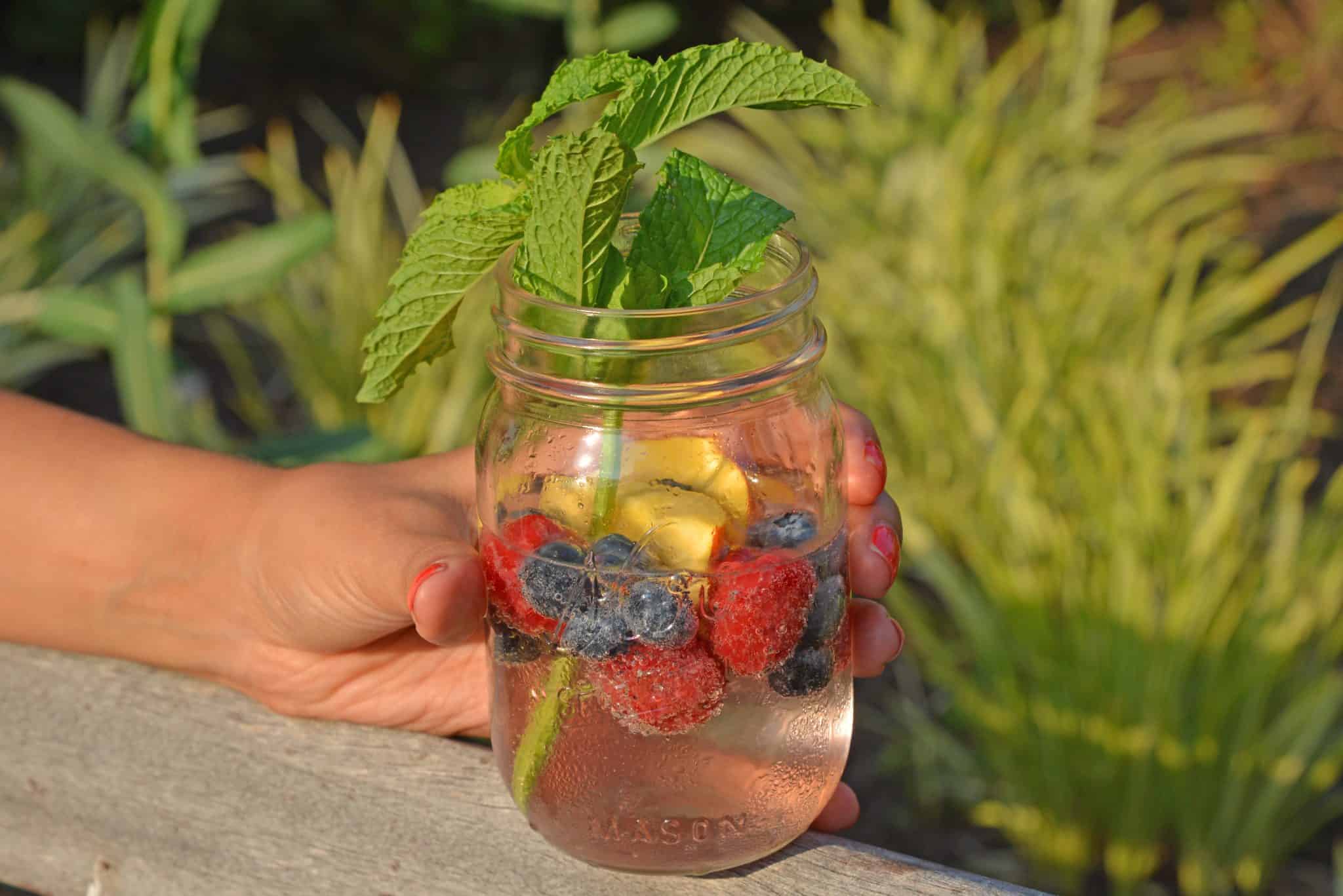 Sparkling Peach Sangria is the perfect summer cocktail recipe for your next party! Make a non-alcoholic and alcoholic version with fresh summer fruits.