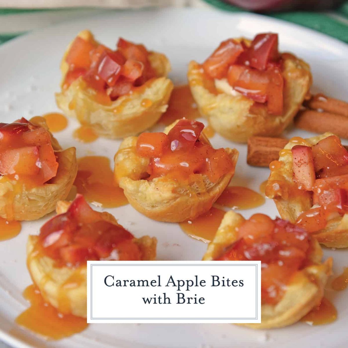 Caramel Apple Bites with Brie are a quick apple tart recipe using puff pastry. The best mix between mini caramel apples and salted caramel apple pie! #caramelapplebites #minicaramelapples www.savoryexperiments.com