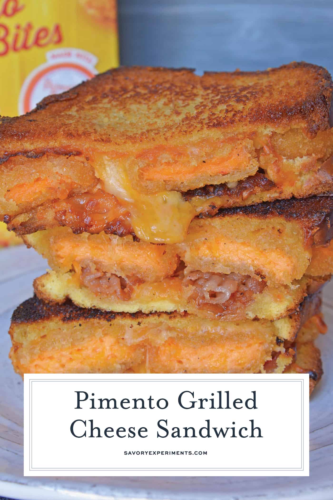 Pimento Grilled Cheese Sandwiches are the ultimate grilled cheese recipe. Zesty pimento cheese bites with bacon, gouda, cheddar and red pepper jelly on thick cut potato bread. #grilledcheesesandwichrecipes #pimentocheese www.savoryexperiments.com