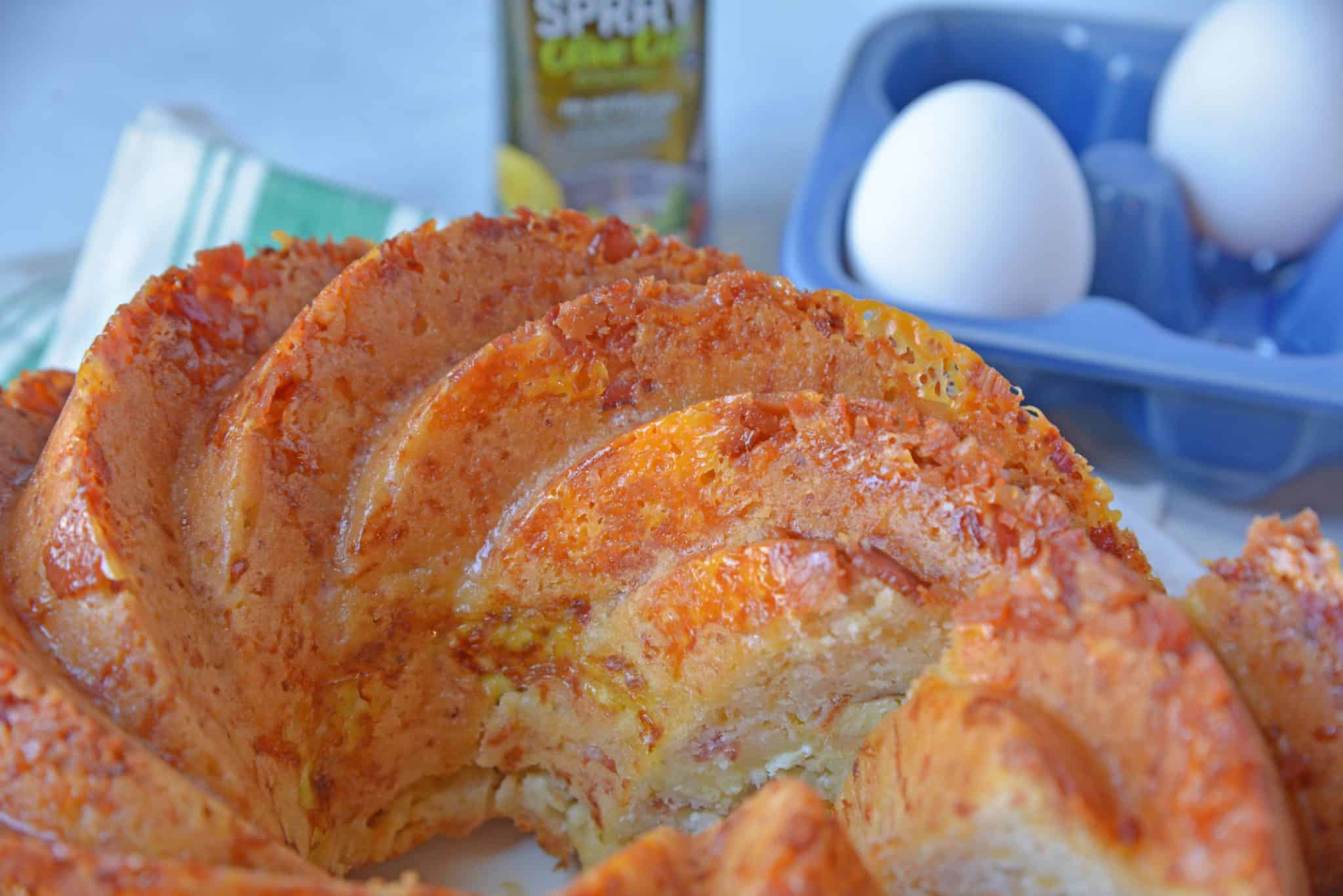 Bacon, Egg and Cheese Breakfast Bread is an easy breakfast recipe for feeding a large group. Prepare ingredients before and simply bake in the morning. #breakfastbread #easybreakfastrecipes www.savoryexperiments.com 