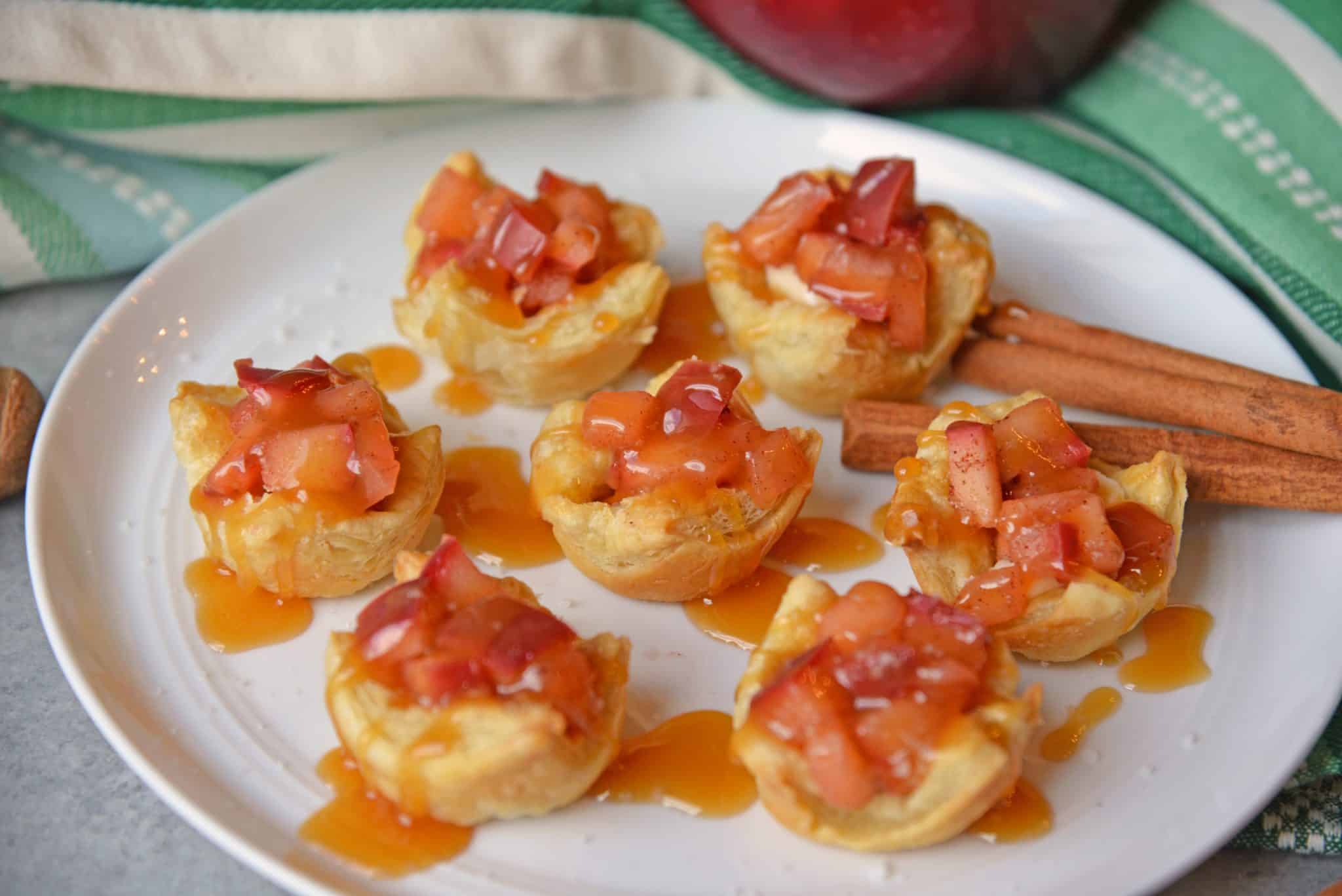plate of apple pie tarts with caramel drizzle 