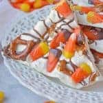 Halloween Bark is a sweet and salty bark. The easiest no bake, make in ahead and in large quantities Halloween dessert out there! #halloweendesserts #howtomakebark www.savoryexperiments.com