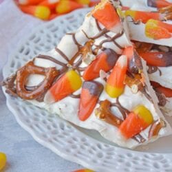 Halloween Bark is a sweet and salty bark. The easiest no bake, make in ahead and in large quantities Halloween dessert out there! #halloweendesserts #howtomakebark www.savoryexperiments.com