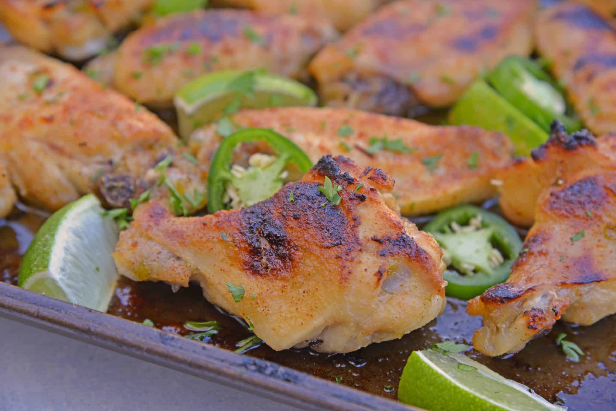 Sweet and spicy Jalapeno Lime Wings are baked wings perfect for holiday parties or watching the big game. A unique flavor everyone will love. #bakedchickenwings #chickenwingrecipes www.savoryexperiments.com