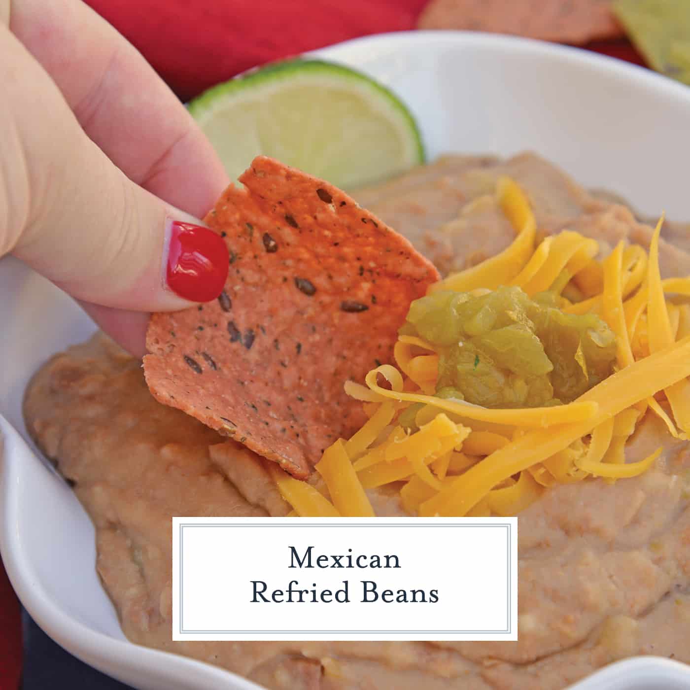 Mexican Refried Beans are an easy homemade refried bean recipe using pinto beans, green chilies, cheese and Mexican spices. Ready in just 15 minutes! #refriedbeans #mexicansidedish www.savoryexperiments.com 