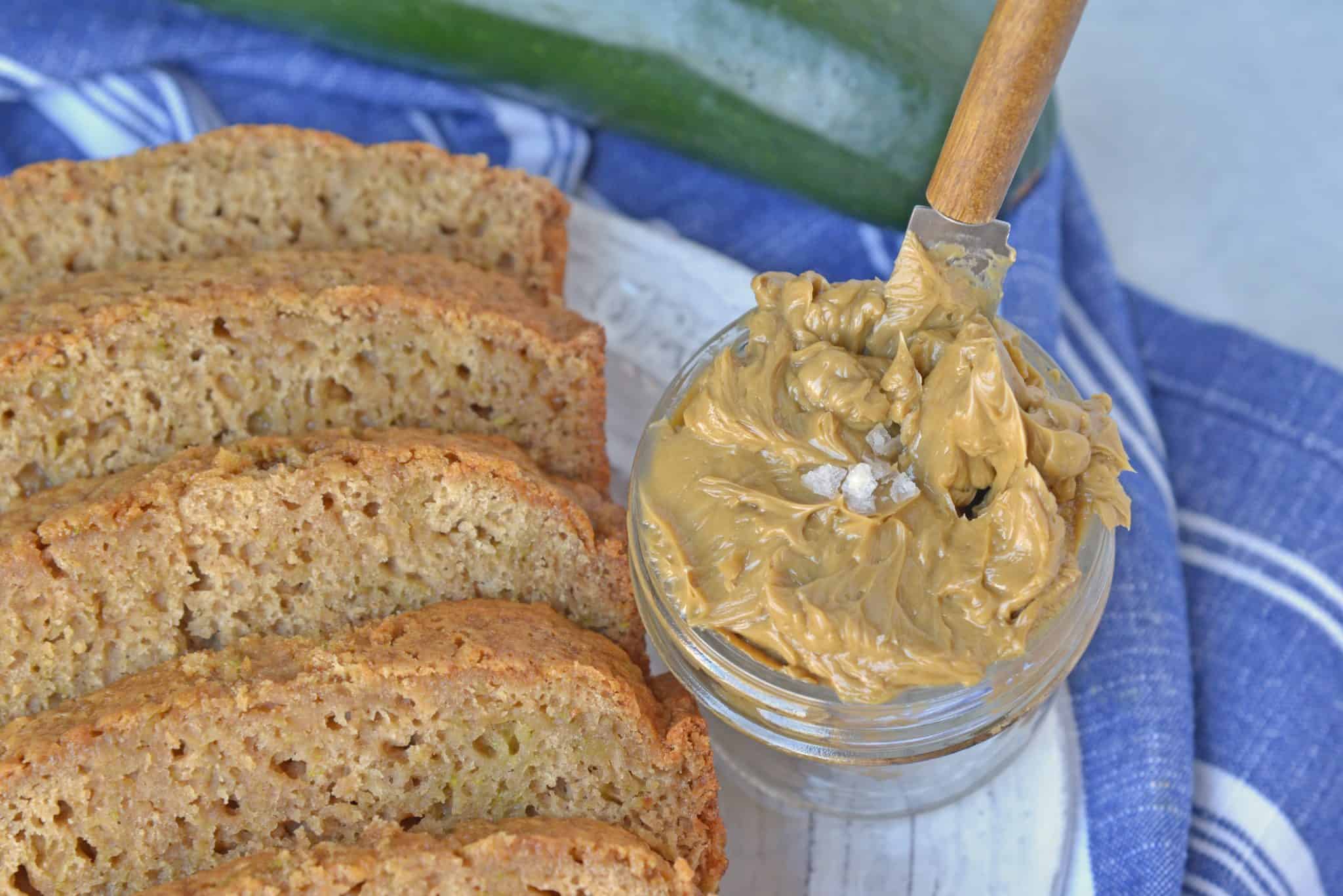 Molasses Butter is the blend of butter, molasses and one secret ingredient that will never guess until see the recipe! Served best on fresh zucchini bread and biscuits! #flavoredbutter #molassesbutter www.savoryexperiments.com 