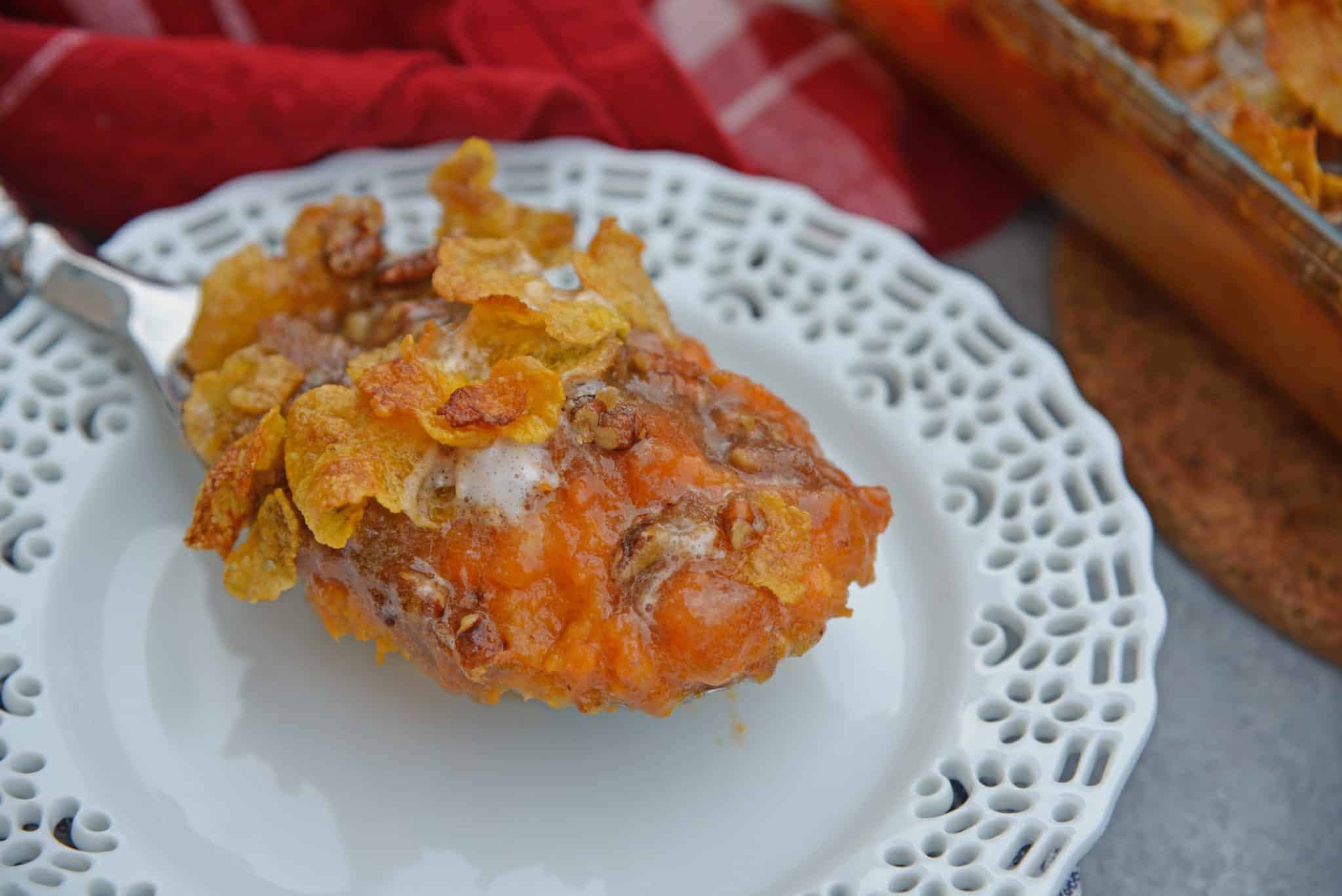 Sweet Potato Casserole with Pecans is the ultimate sweet potato souffle recipe using fresh sweet potatoes, pecan topping and marshmallows. #sweetpotatocasserole #sweetpotatosouffle www.savoryexperiments.com