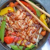 Teriyaki Shrimp Stir Fry in a black bowl