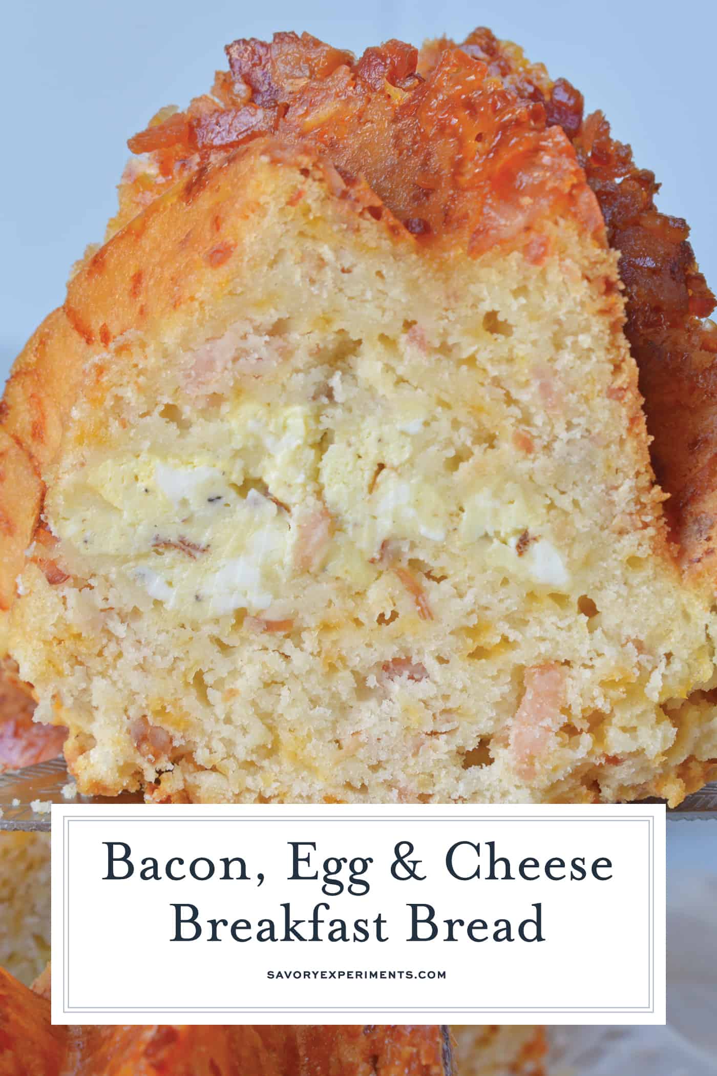Bacon, Egg and Cheese Breakfast Bread is an easy breakfast recipe for feeding a large group. Prepare ingredients before and simply bake in the morning. #breakfastbread #easybreakfastrecipes www.savoryexperiments.com