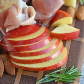 Tips for building the ultimate cheese board, the perfect easy party appetizer that requires no cooking! Ideas for meat, cheese and accompaniments. #cheeseboard #cheeseplatter www.savoryexperiments.com