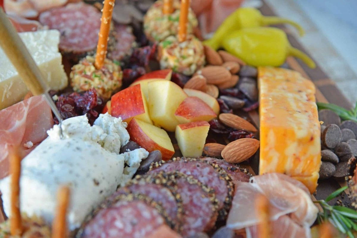 close up of chopped apple on a charcuterie board 