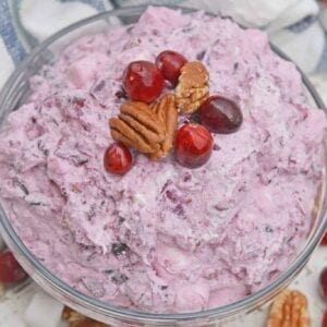 Fruit Fluff Salad is a classic side dish for the holidays combining Cherry Fluff, Pineapple Fluff and Cranberry Fluff Salad into one! #fruitfluffsalad #fluffsaladrecipe www.savoryexperiments.com