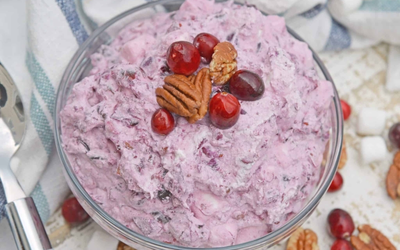 Fruit Fluff Salad is a classic side dish for the holidays combining Cherry Fluff, Pineapple Fluff and Cranberry Fluff Salad into one! #fruitfluffsalad #fluffsaladrecipe www.savoryexperiments.com