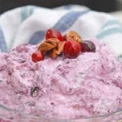 Fruit Fluff Salad is a classic side dish for the holidays combining Cherry Fluff, Pineapple Fluff and Cranberry Fluff Salad into one! #fruitfluffsalad #fluffsaladrecipe www.savoryexperiments.com