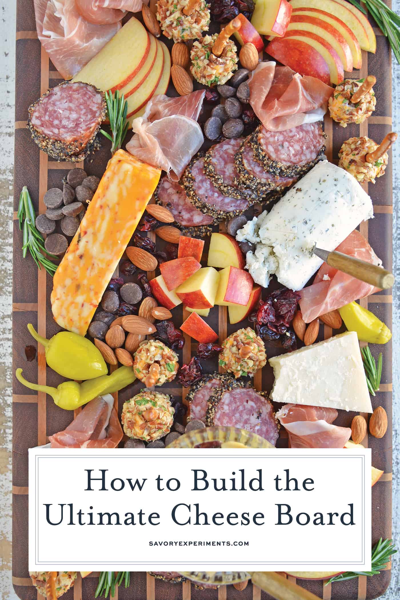 Tips for building the ultimate cheese board, the perfect easy party appetizer that requires no cooking! Ideas for meat, cheese and accompaniments. #cheeseboard #cheeseplatter www.savoryexperiments.com