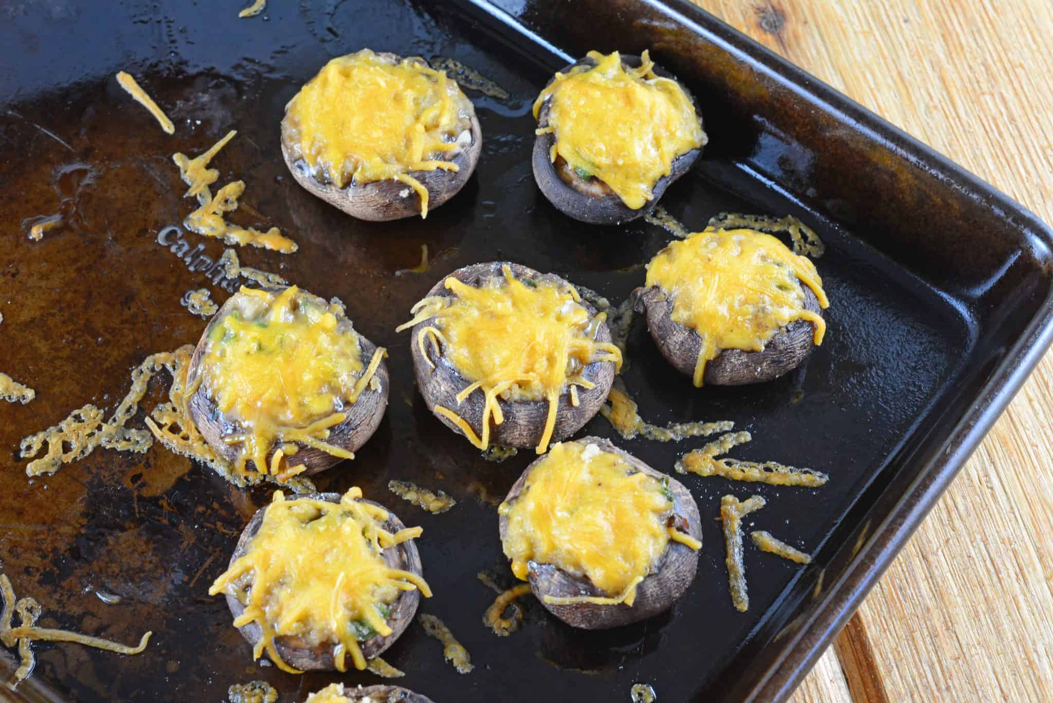 Creamy Jalapeno Stuffed Mushrooms are an easy jalapeno popper make ahead recipe using cream cheese and fresh jalapenos. The perfect party appetizer! #stuffedmushrooms #jalapenopopperrecipes #makeaheadappetizers www.savoryexperiments.com 