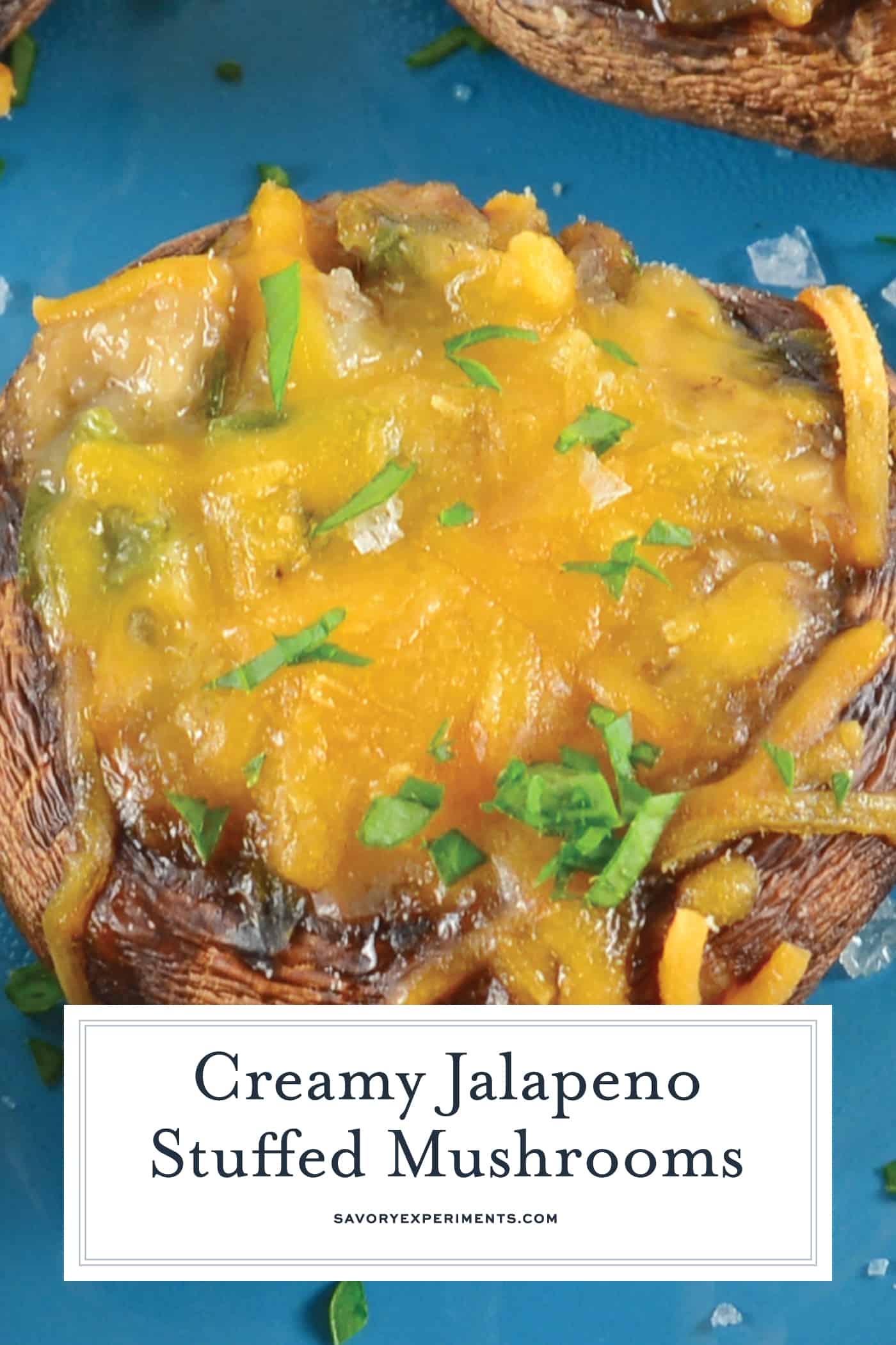 Creamy Jalapeno Stuffed Mushrooms are an easy jalapeno popper make ahead recipe using cream cheese and fresh jalapenos. The perfect party appetizer! #stuffedmushrooms #jalapenopopperrecipes #makeaheadappetizers www.savoryexperiments.com