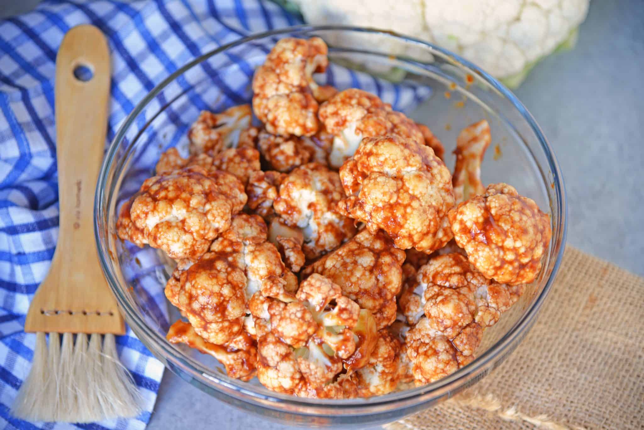 BBQ Cauliflower Bites make a healthy and quick appetizer or side. Make them zesty, tangy or even sweet! #cauliflowerrecipes #bbqcauliflowerbites www.savoryexperiments.com 