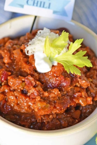 Blue Ribbon Award Winning Chili is, you guessed it, a chili cook-off winning recipe! A robust and rich stew loaded with beef, sausage, bacon and tons of vegetables. The best chili recipe ever! #awardwinningchili #bestchilirecipe www.savoryexperiments.com