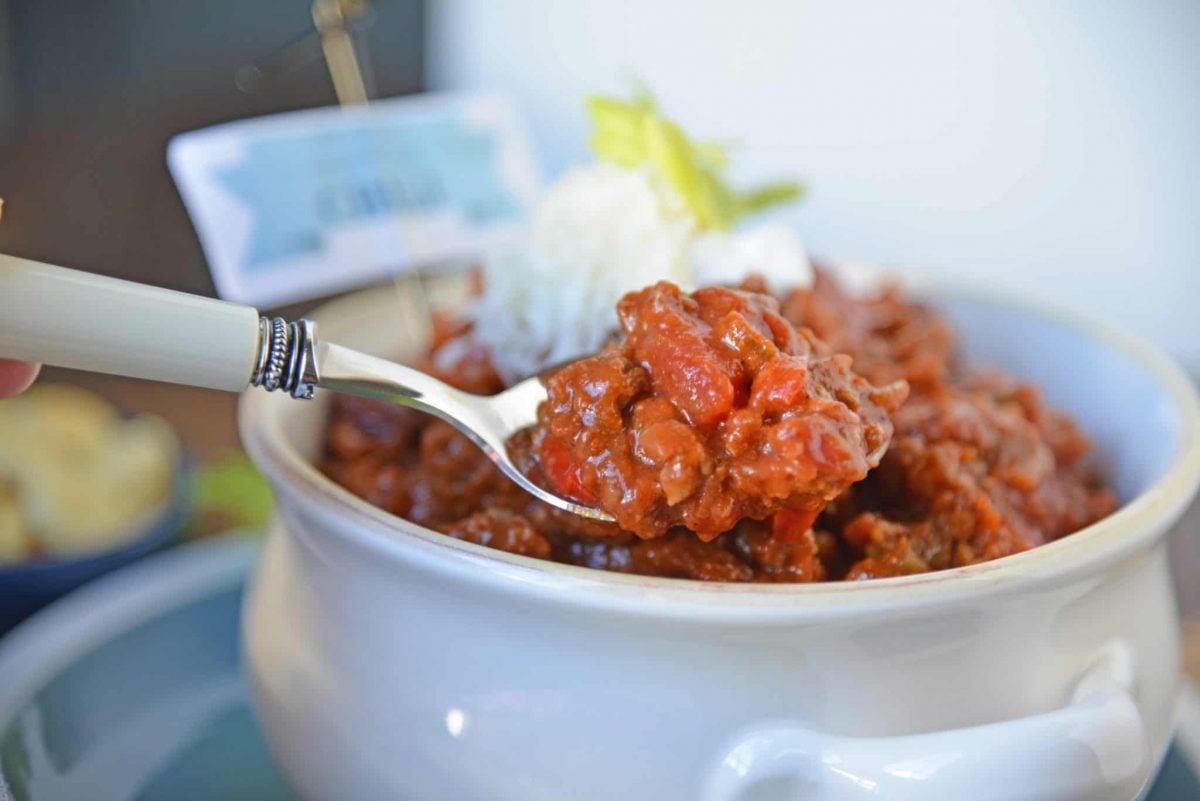 Blue Ribbon Award Winning Chili is, you guessed it, a chili cook-off winning recipe! A robust and rich stew loaded with beef, sausage, bacon and tons of vegetables. The best chili recipe ever! #awardwinningchili #bestchilirecipe www.savoryexperiments.com