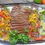 Sheet Pan Steak Fajitas are an easy weeknight meal using tender beef, homemade fajita seasoning, peppers, onions and jalapenos! #sheetpanrecipes #steakfajitas #bestangusbeef #steakholder www.savoryexperiments.com