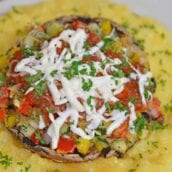 One of the best easy vegetarian recipes are Stuffed Portabella Mushrooms. A great vegetarian dinner idea perfect for meatless Monday! #stuffedmushrooms #vegetarianrecipes www.savoryexperiments.com