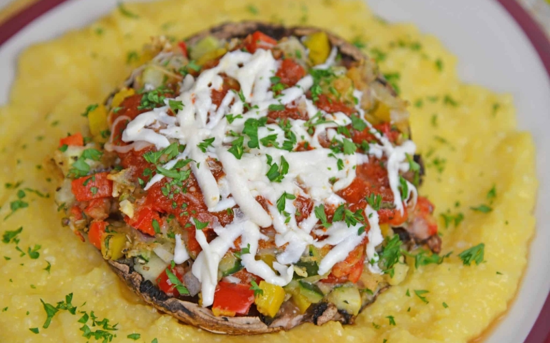 One of the best easy vegetarian recipes are Stuffed Portabella Mushrooms. A great vegetarian dinner idea perfect for meatless Monday! #stuffedmushrooms #vegetarianrecipes www.savoryexperiments.com