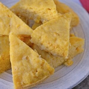 Instant Pot Sweet Cornbread is an easy cornbread recipe made with honey making it both sweet and moist. Made in the Instant Pot, it cooks in half the time! #cornbreadrecipe #instantpotrecipes #sweetcornbread www.savoryexperiments.com