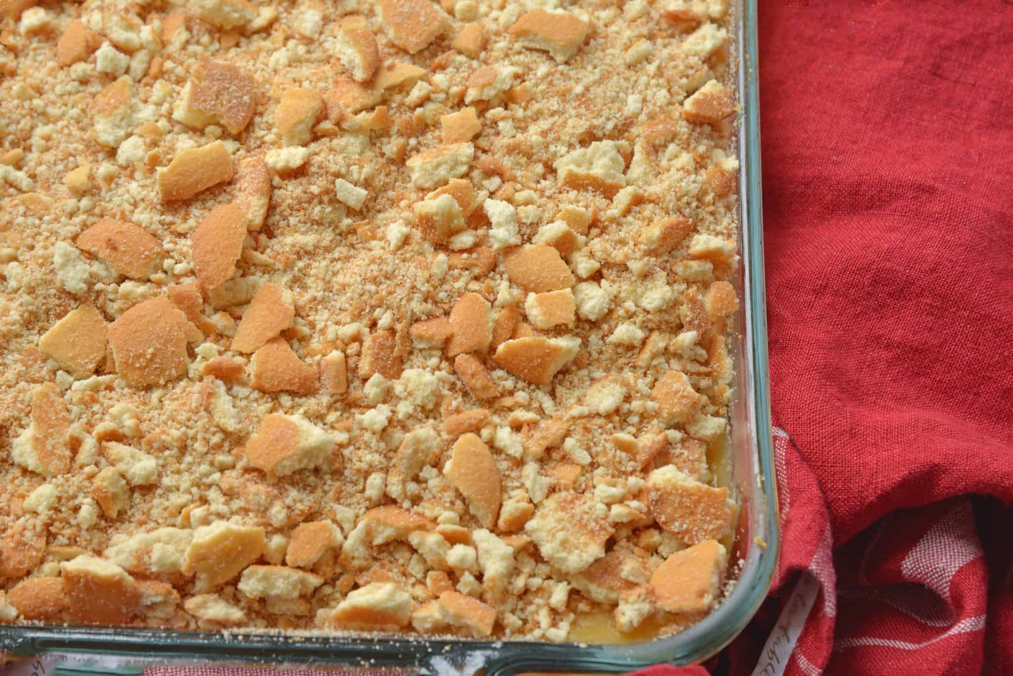 This Caramel Apple Poke Cake is one of the best recipes using boxed cake mix! With tons of apples, and cinnamon, this from scratch apple cake will become an instant family favorite! #pokecakerecipes #recipesusingboxedcakemix #applecake #easypokecakerecipes #savoryexperiments www.savoryexperiments.com