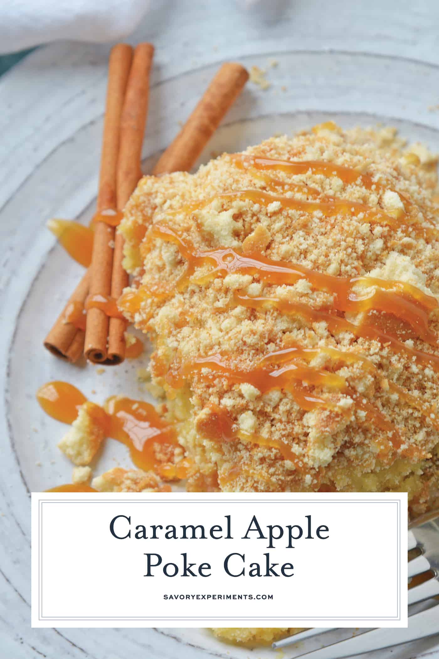 slice of apple poke cake with text overlay for pinterest