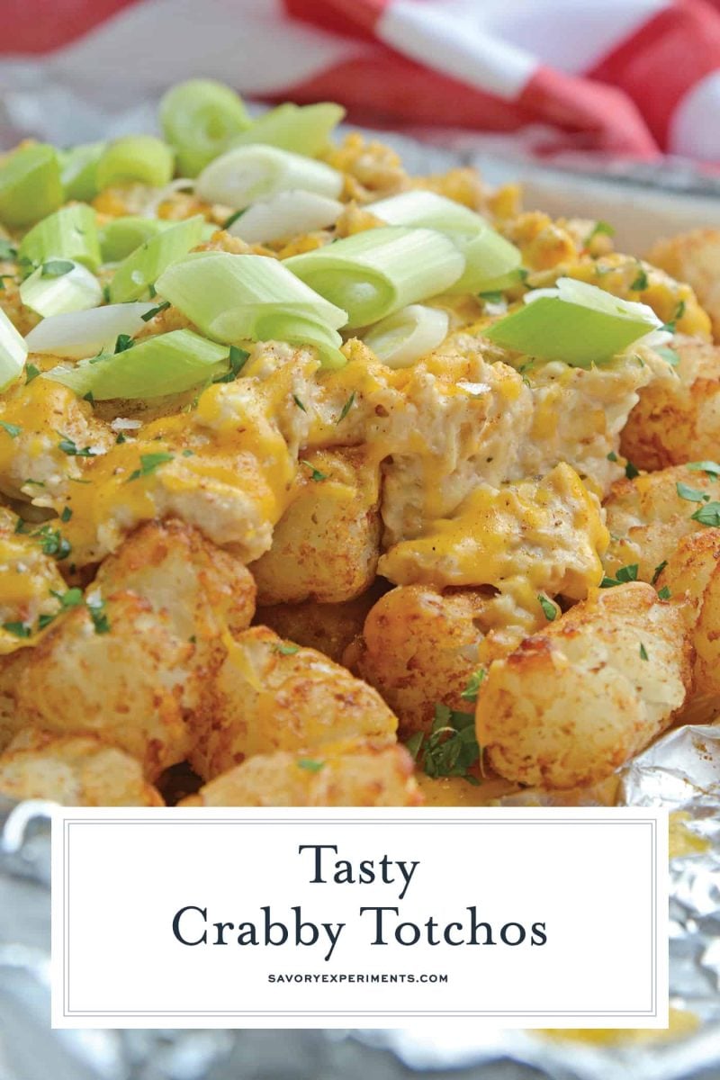 Crabby Totchos are crispy fried tater tots smothered in hot crab dip and topped with melty cheddar cheese. The perfect party appetizer! #tatertots #easyappetizerrecipes www.savoryexperiments.com