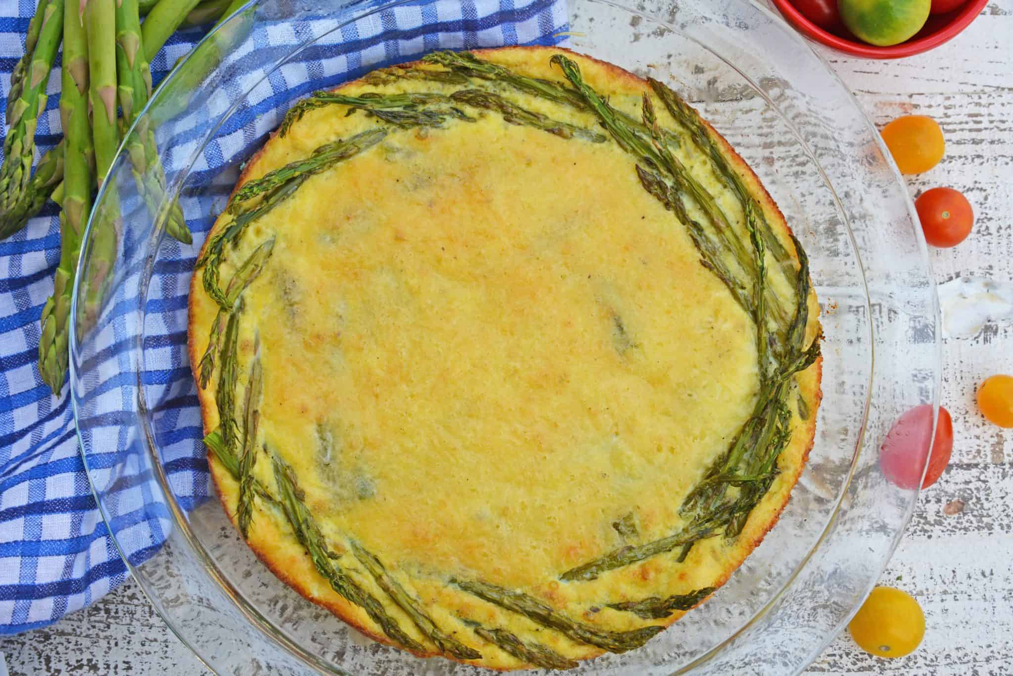 This crustless quiche recipe is one of the best asparagus recipes. An asparagus quiche would be a great addition to your next breakfast, brunch or lunch! #asparagusquicherecipe #crustlessquicherecipe #asparagusrecipes www.savoryexperiments.com